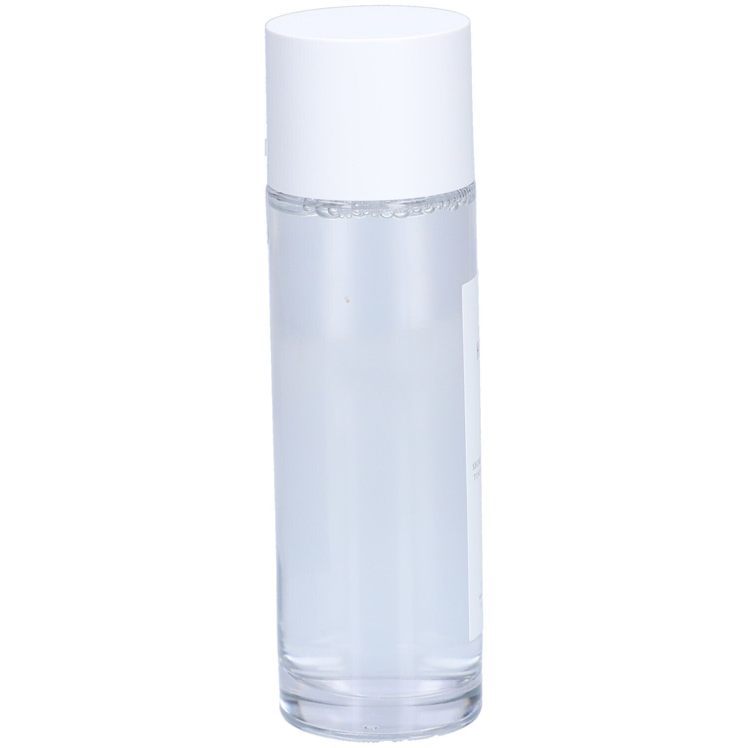 Flacon cylindrique blanc avec bouchon. Étiquette avec informations produit. Liquide clair visible.