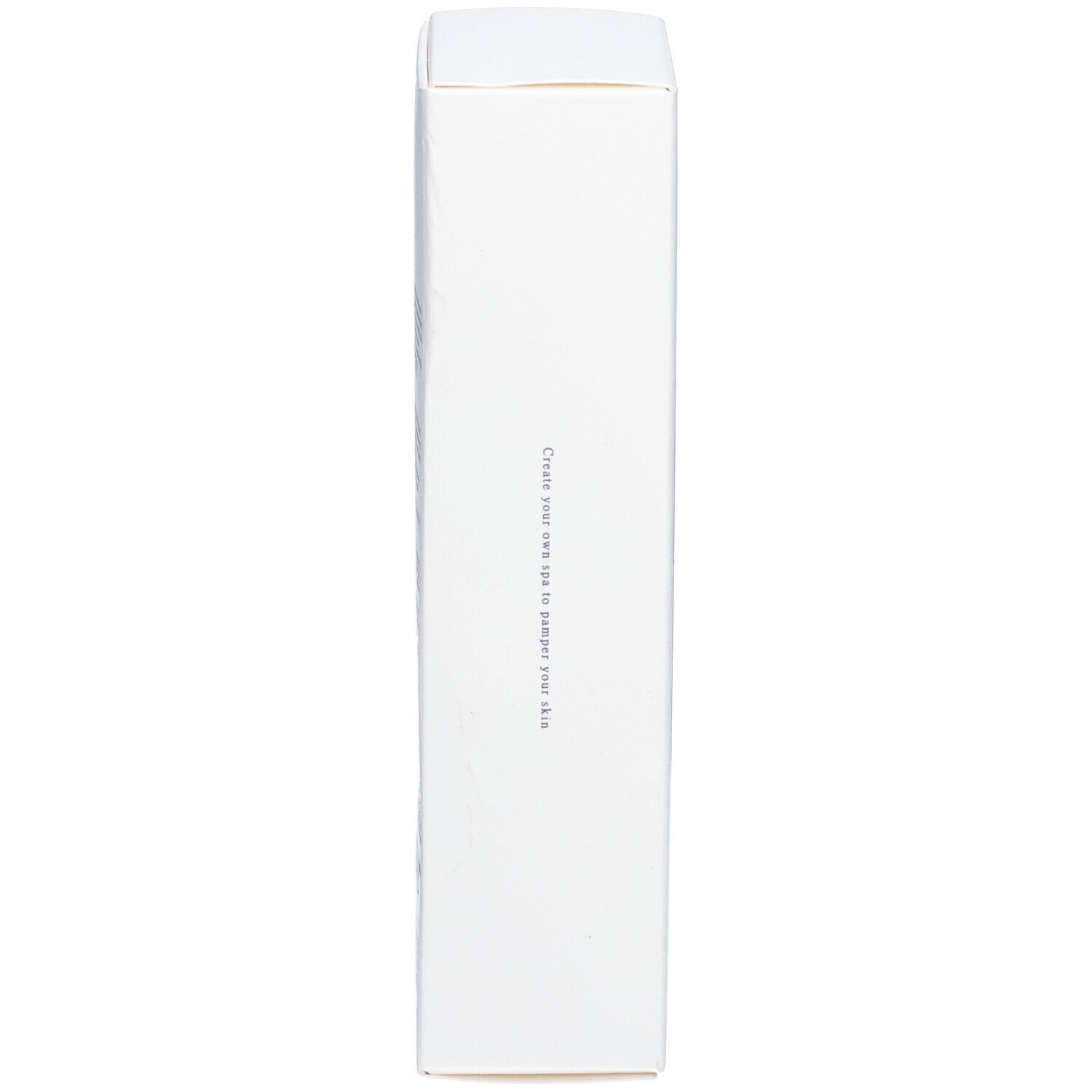 Emballage produit blanc, forme rectangulaire étroite. Texte sur le côté, écriture grise.