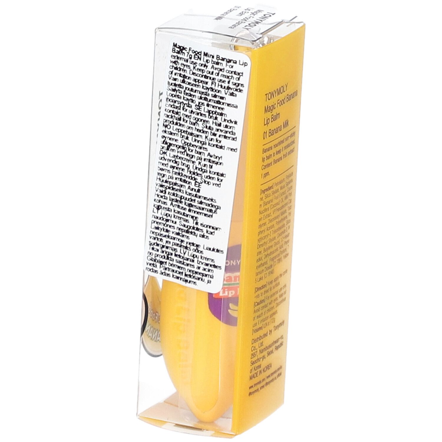 Emballage jaune avec texte. Inscription : TONYMOLY Magic Food Banana Lip Balm. Produit dans un emballage transparent.