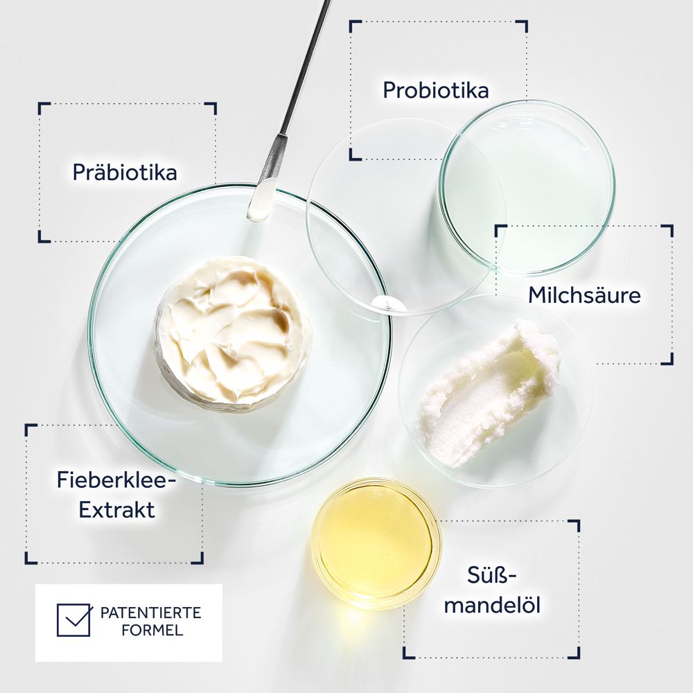 Boîtes de Pétri contenant des probiotiques, prébiotiques, extrait de trèfle d'eau, acide lactique et huile d'amande douce. "Formule brevetée" est indiqué.
