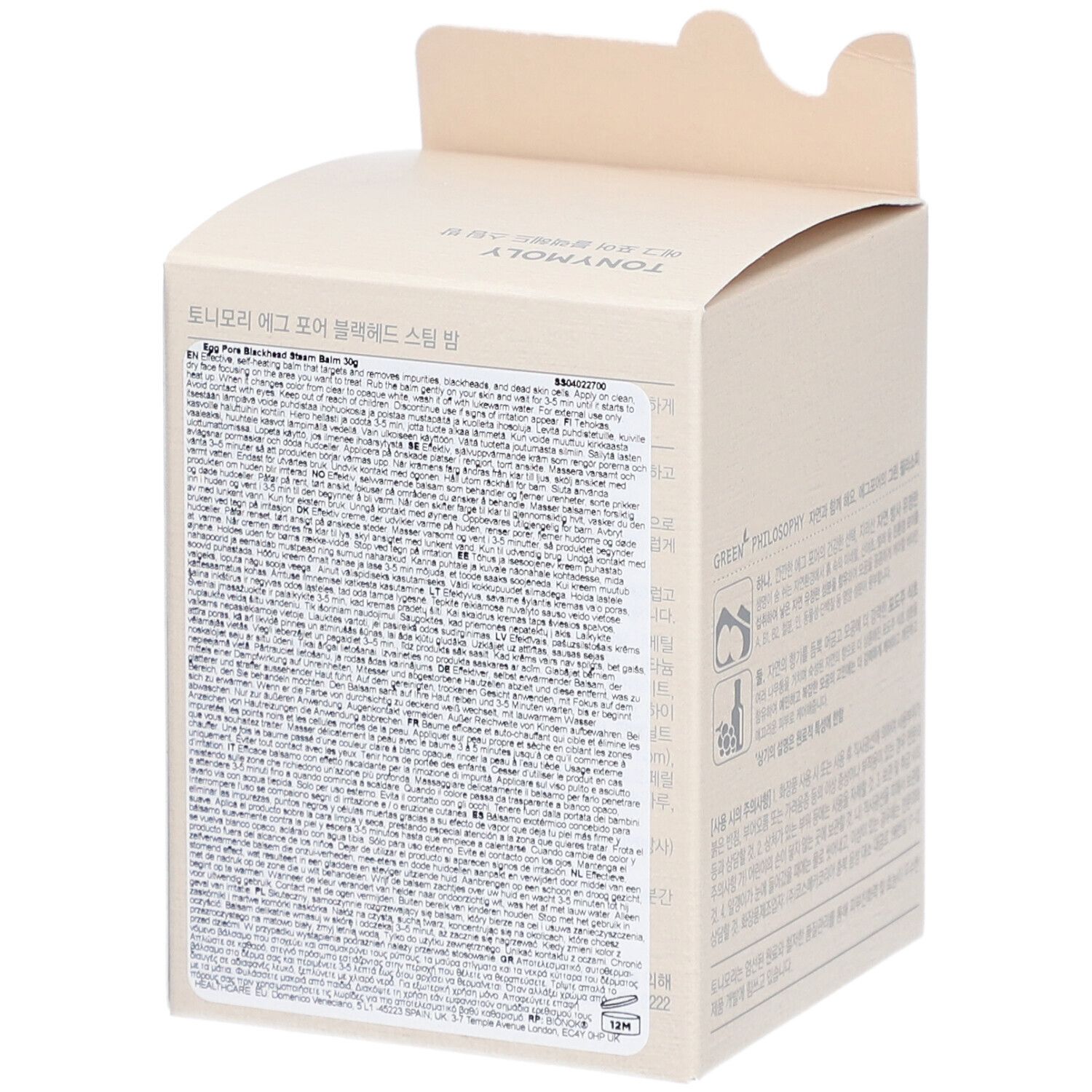 Boîte en carton beige avec texte. Dos avec texte en plusieurs langues. Design de poulet en haut.