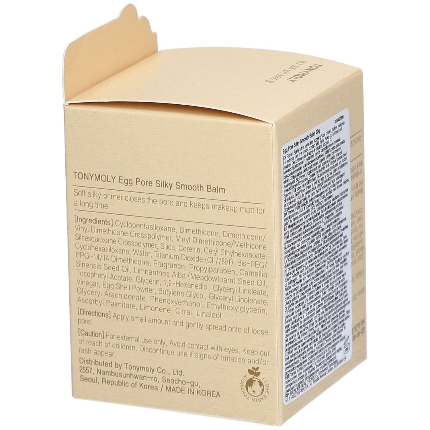 Boîte beige, dos avec texte. Marque : TONYMOLY. Produit : Egg Pore Silky Smooth Balm. Ingrédients et utilisation.