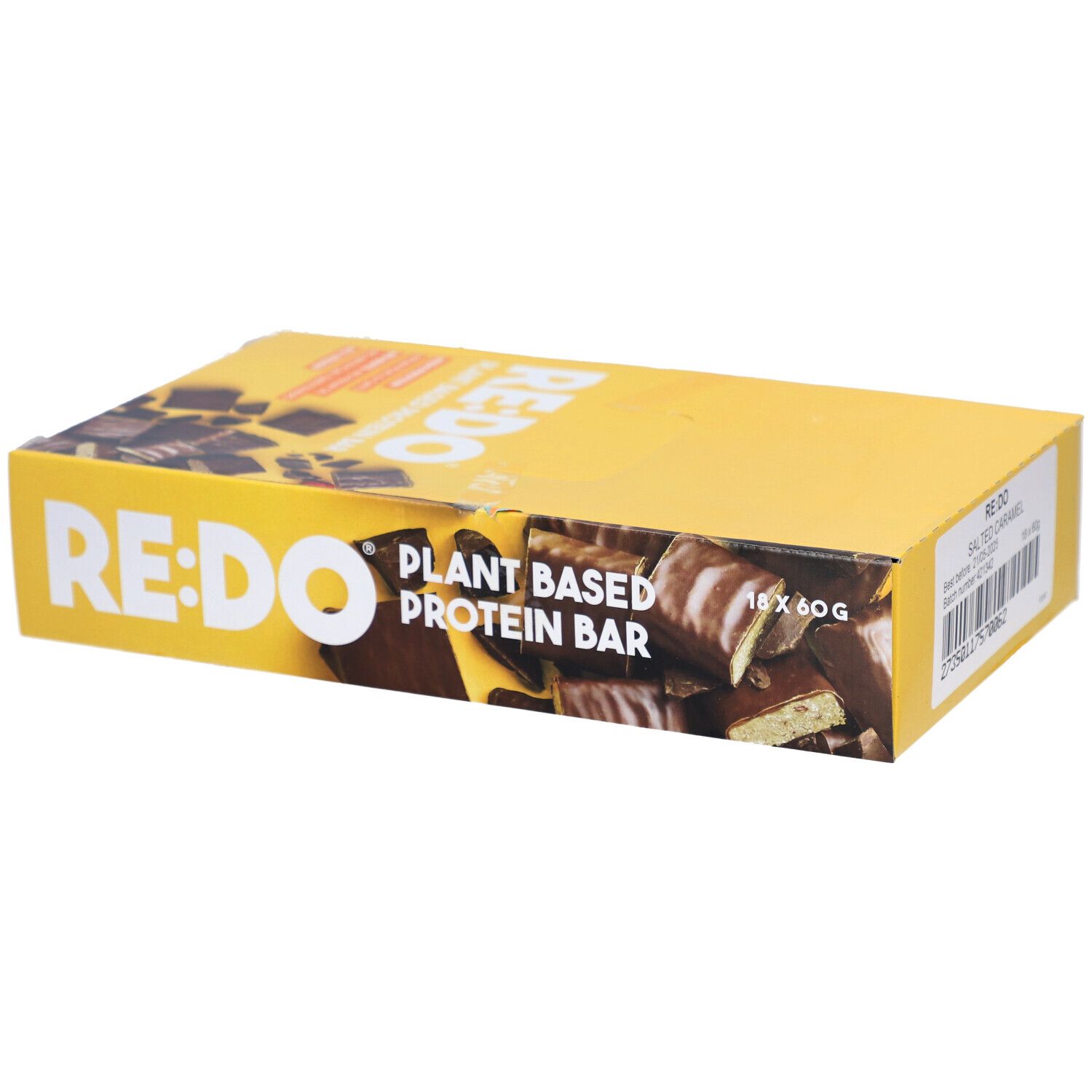 Boîte jaune avec logo RE:DO et texte. Inscription : Plant Based Protein Bar. Contient 18 barres de 60g.