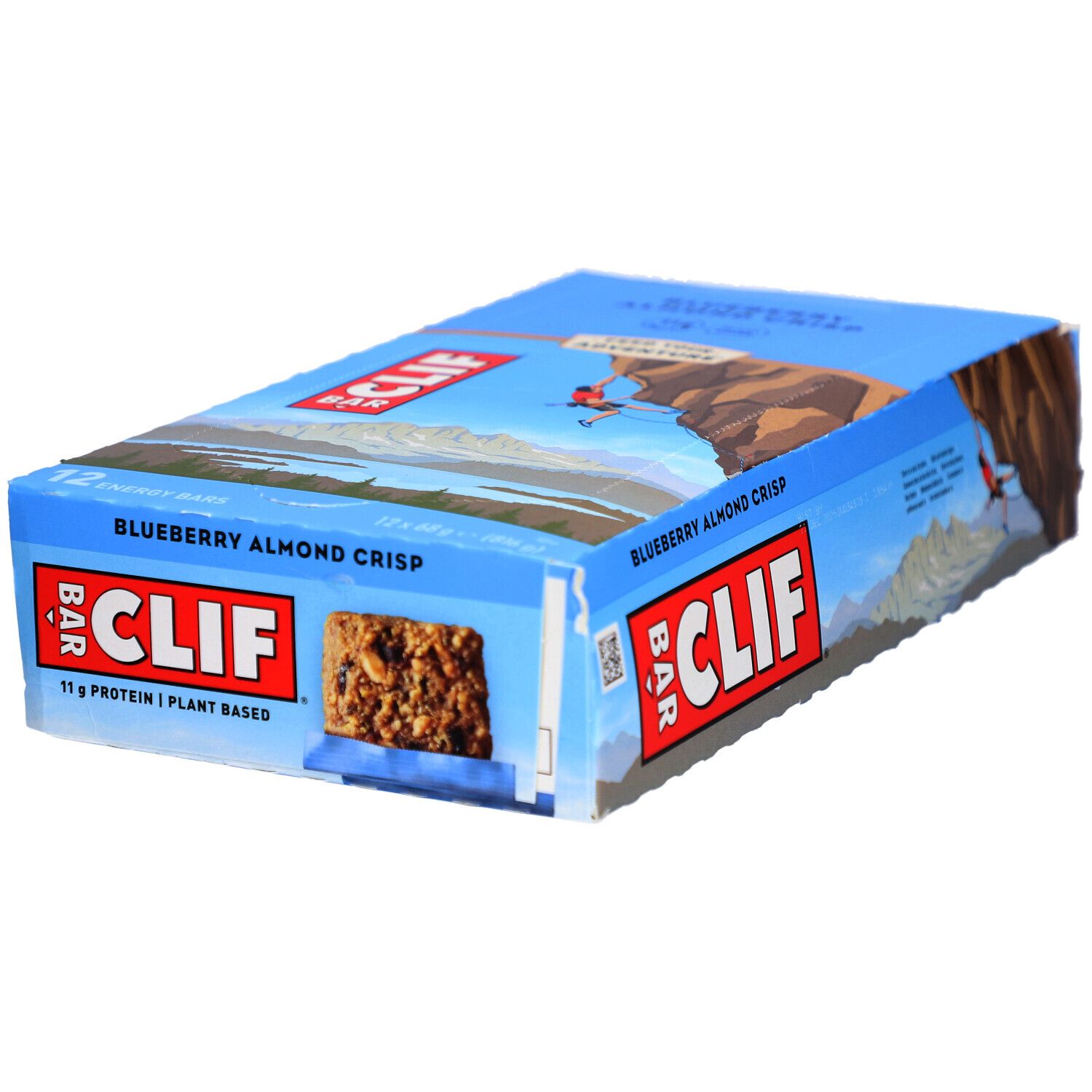 Emballage bleu et blanc CLIF Bar. Inscription Blueberry Almond Crisp. Barre énergétique visible.