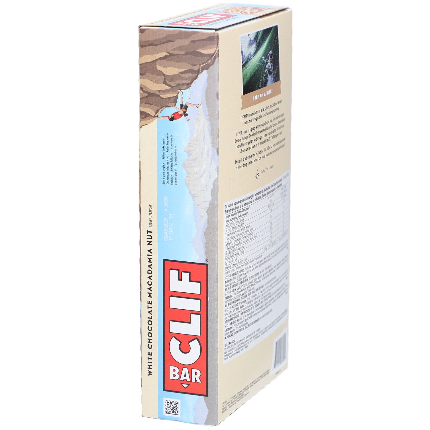 Vue latérale de l'emballage Clif Bar White Chocolate Macadamia Nut. Texte : White Chocolate Macadamia Nut, logo Clif Bar.