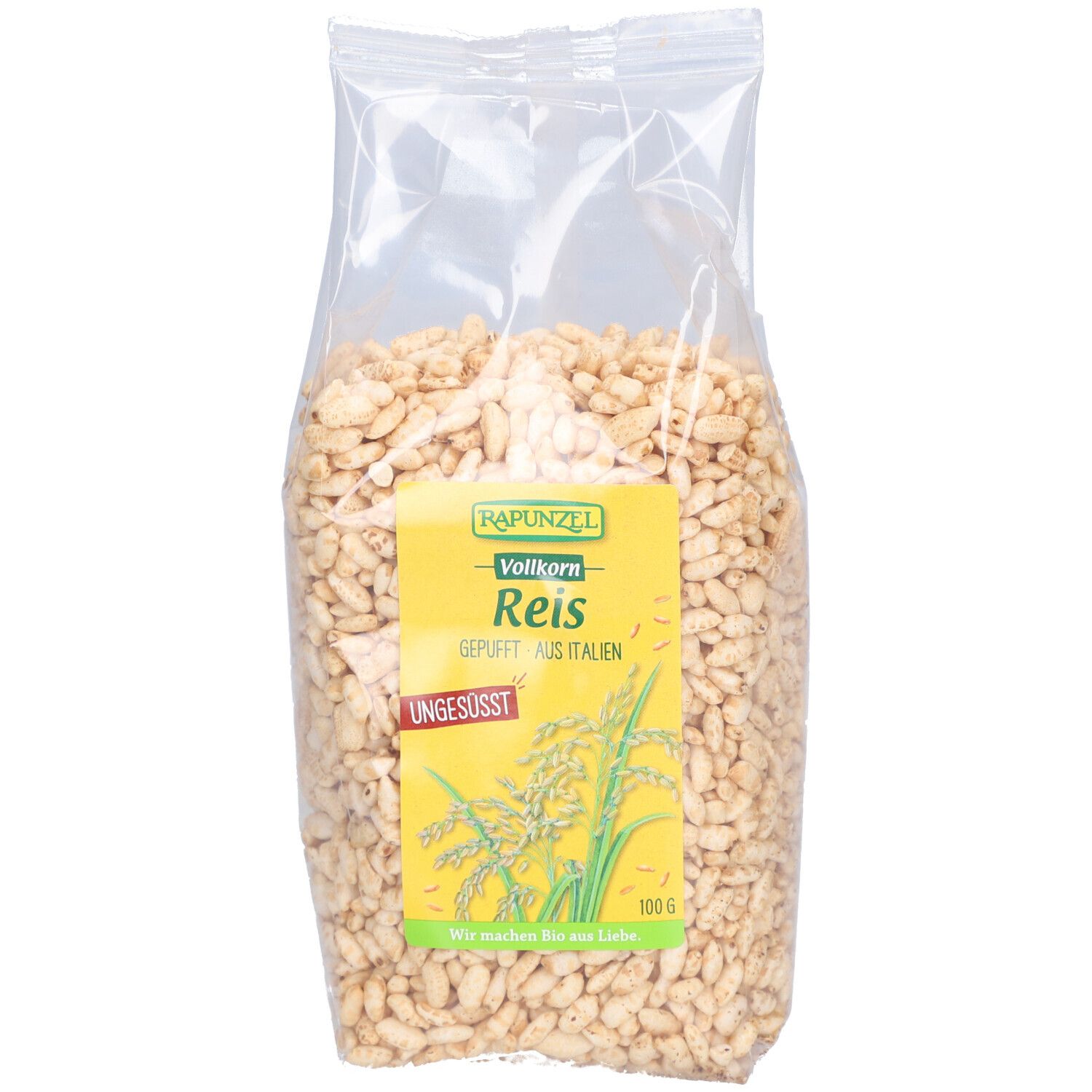 Sachet transparent de riz soufflé. Étiquette jaune avec "Rapunzel", "Vollkorn Reis", "Ungesüßt" et illustration.
