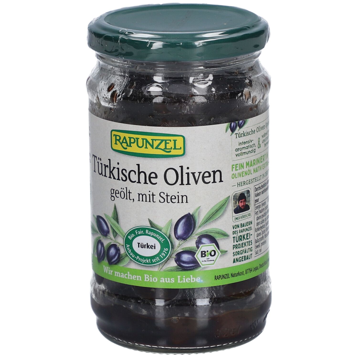 Bocal d'olives noires, huilées, avec noyau. Inscription : Olives turques, Rapunzel. Label bio. Vue détaillée.