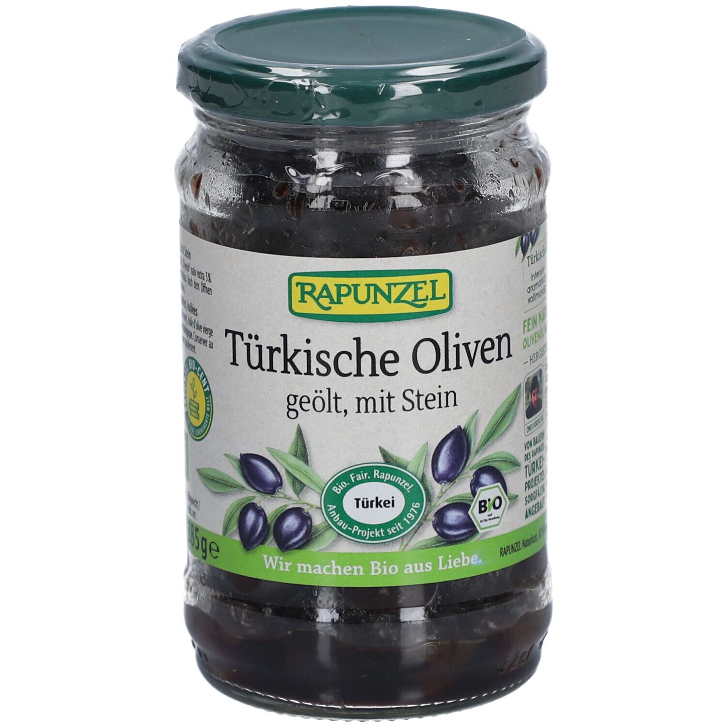 Bocal d'olives noires, huilées, avec noyau. Inscription : Olives turques, Rapunzel. Label bio.