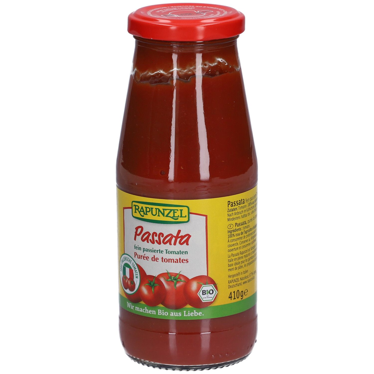 Bouteille en verre de passata. Étiquette avec "Rapunzel Passata", illustrations de tomates, label bio et poids.