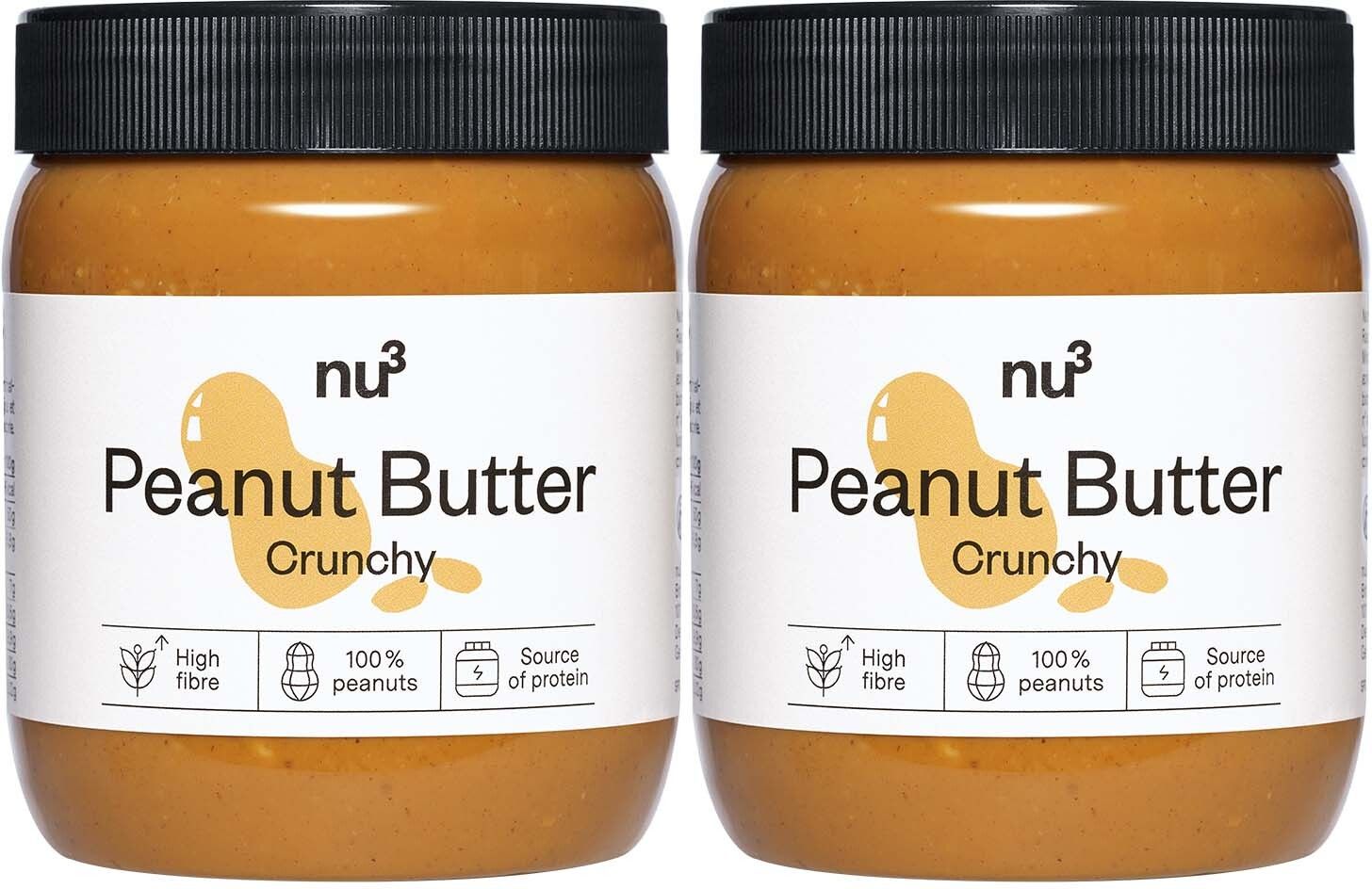 Deux pots de beurre de cacahuète croquant nu3. Étiquette avec nom du produit, logo et informations nutritionnelles. Couvercle noir, pot en verre.