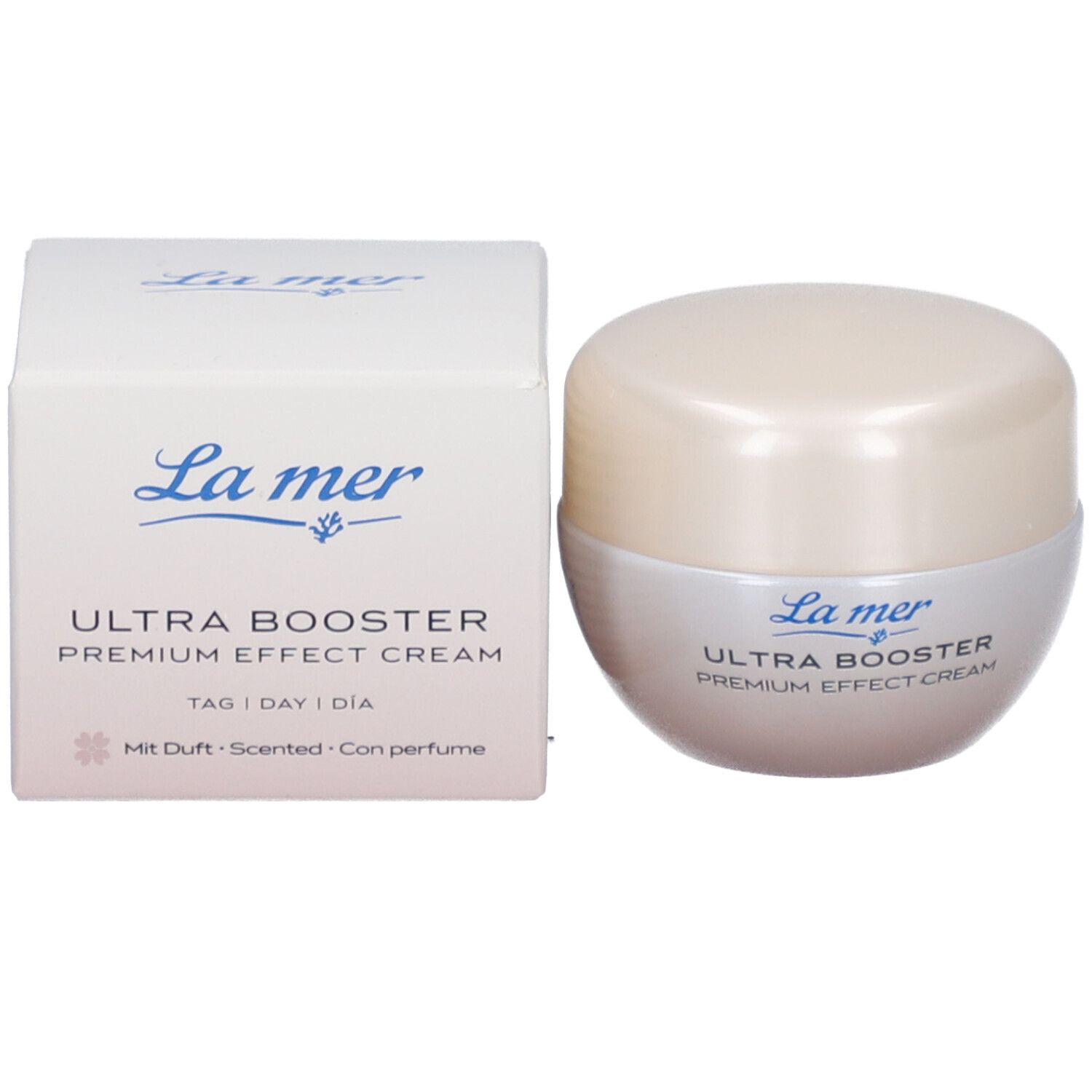 Pot de crème et boîte. Inscription: La mer Ultra Booster Premium Effect Cream. Tag | Day | Día. Mit Duft.