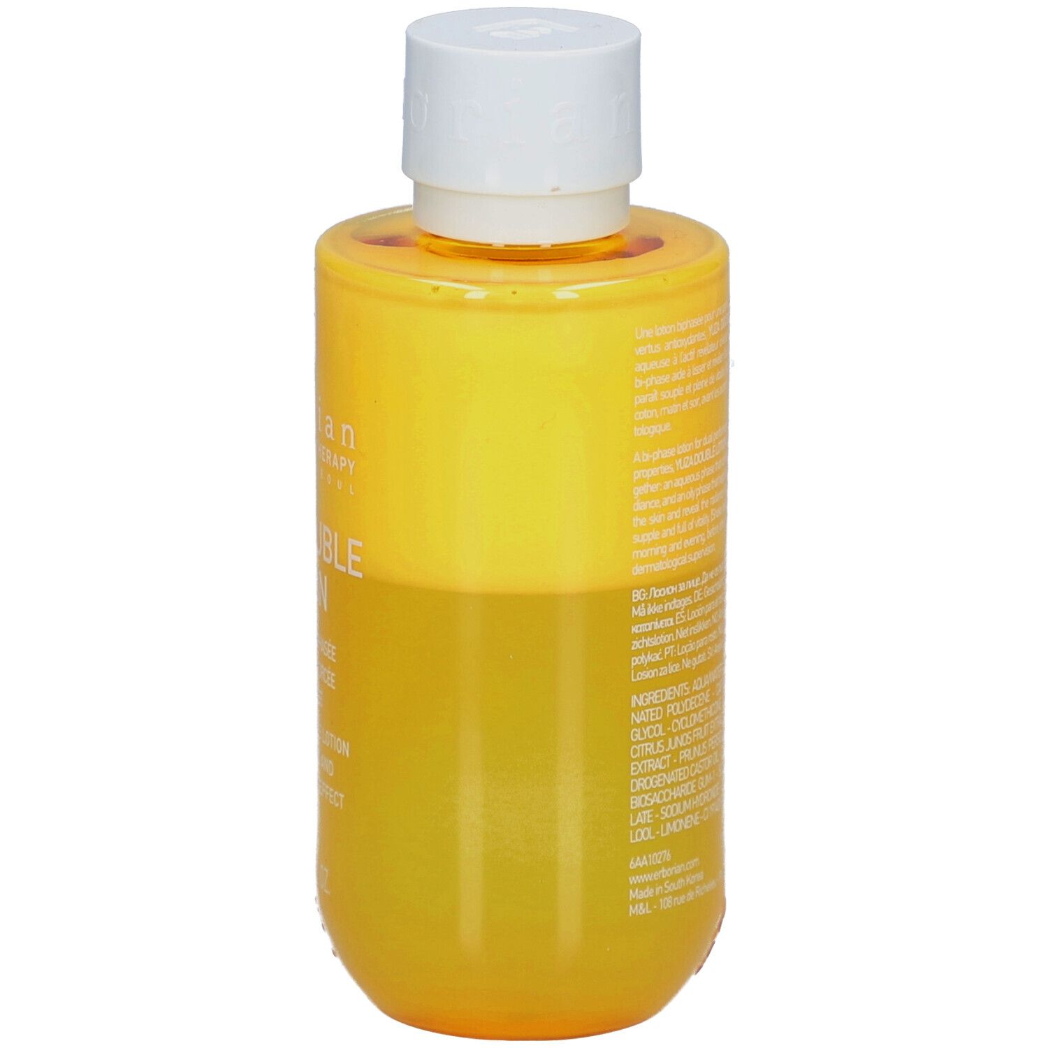 Flacon jaune avec bouchon blanc. Texte au dos. Yuza Double Lotion.