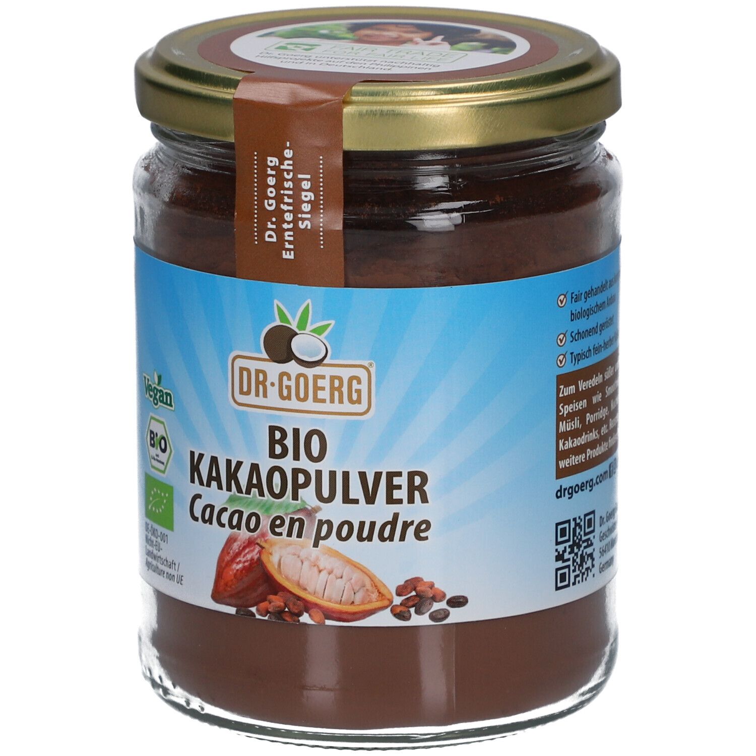 Pot en verre avec poudre brune. Étiquette "DR. GOERG BIO KAKAOPULVER". Labels Vegan et Bio.