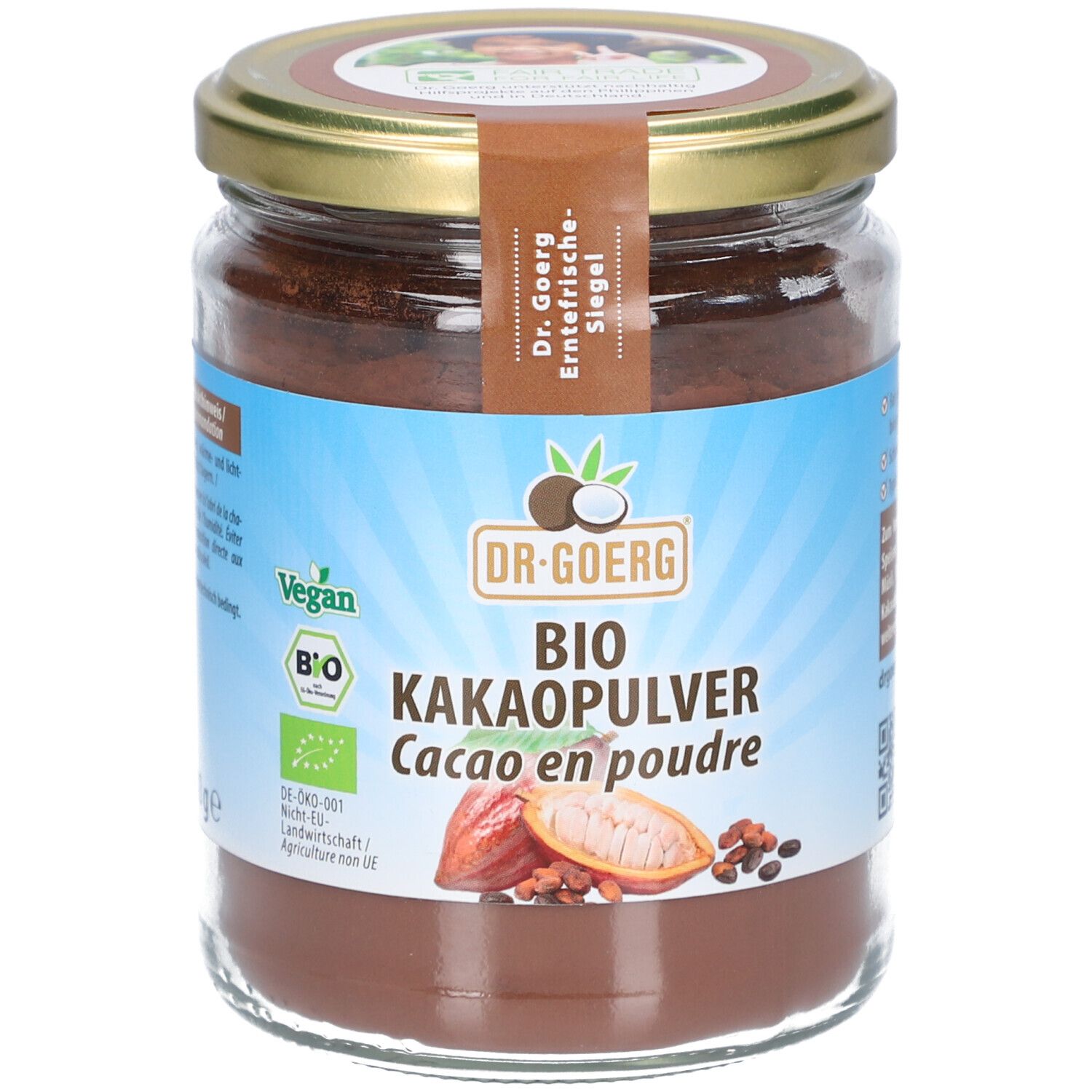 Pot en verre avec poudre brune. Étiquette "DR. GOERG BIO KAKAOPULVER". Labels Vegan et Bio.