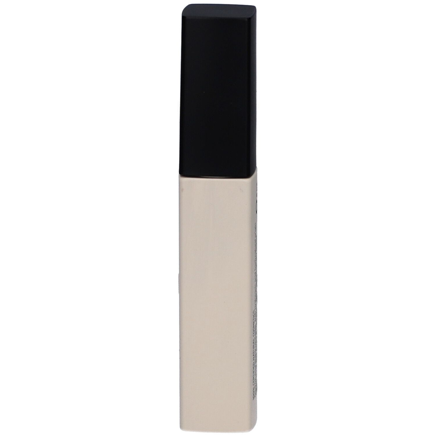 Tube de correcteur avec bouchon noir. Tube beige.