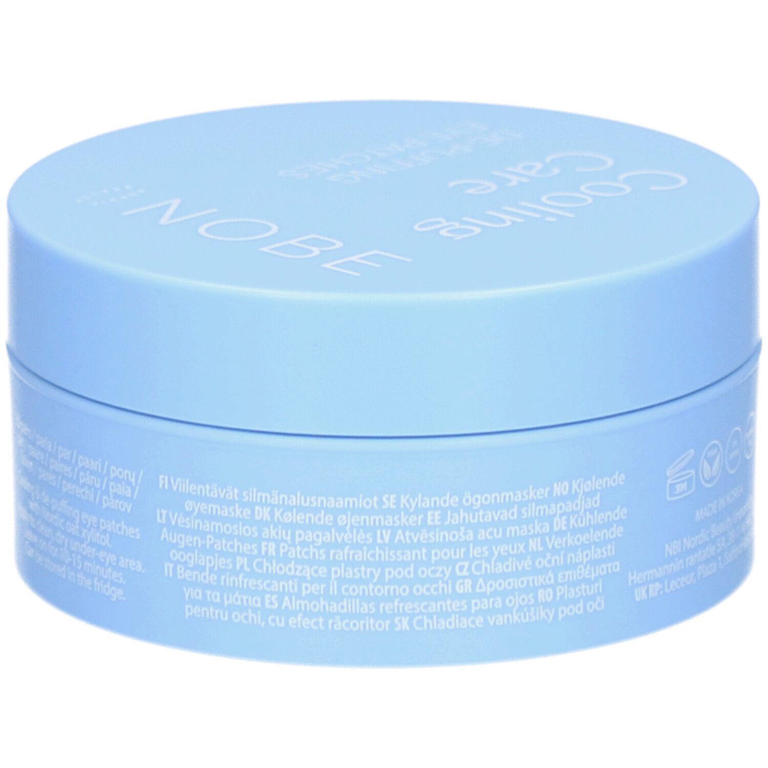 Boîte bleu clair. Inscription : Cooling Care, De-Puffing Eye Patches, NOBE. Texte en plusieurs langues.