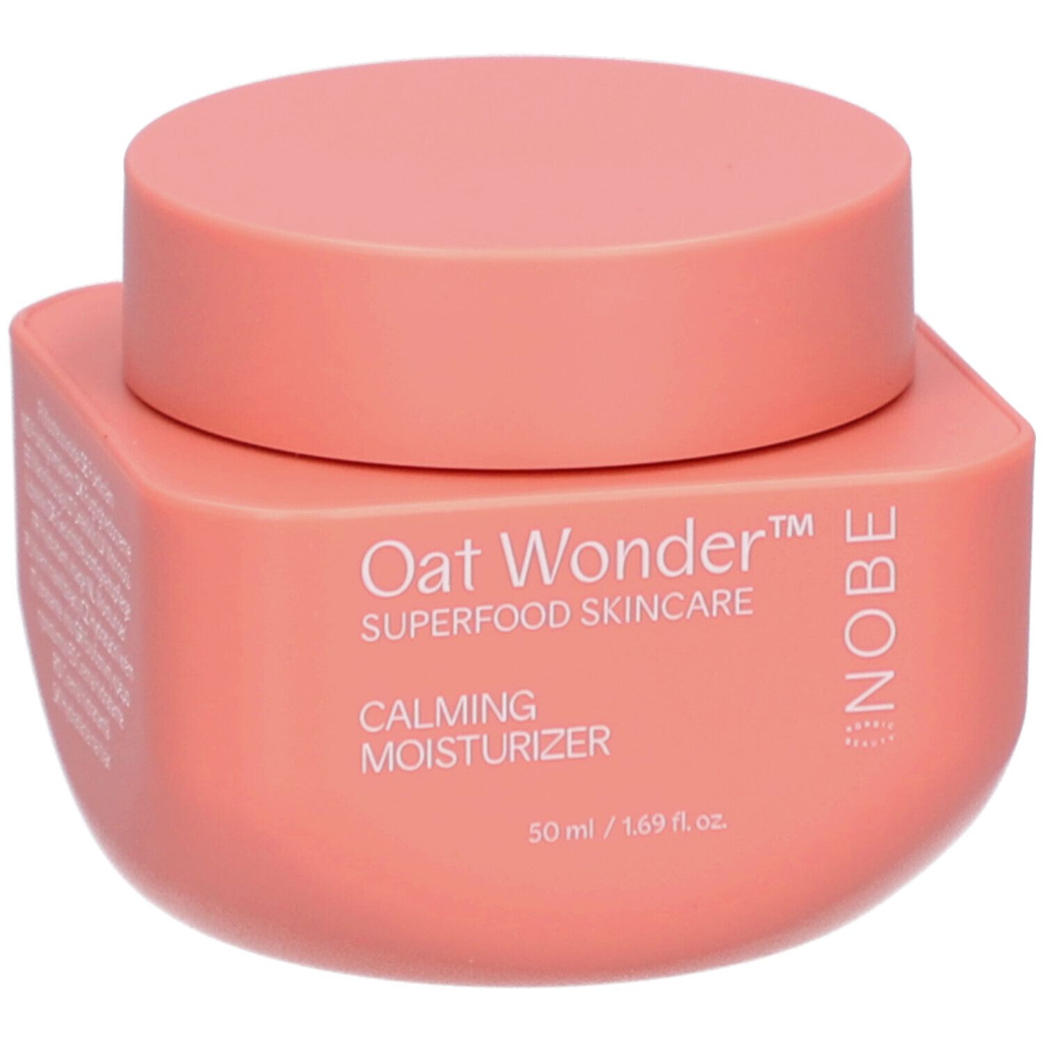 Pot rose avec couvercle. Inscription: Oat Wonder, Superfood Skincare, Calming Moisturizer. 50 ml / 1.69 fl. oz. Logo NOBE.