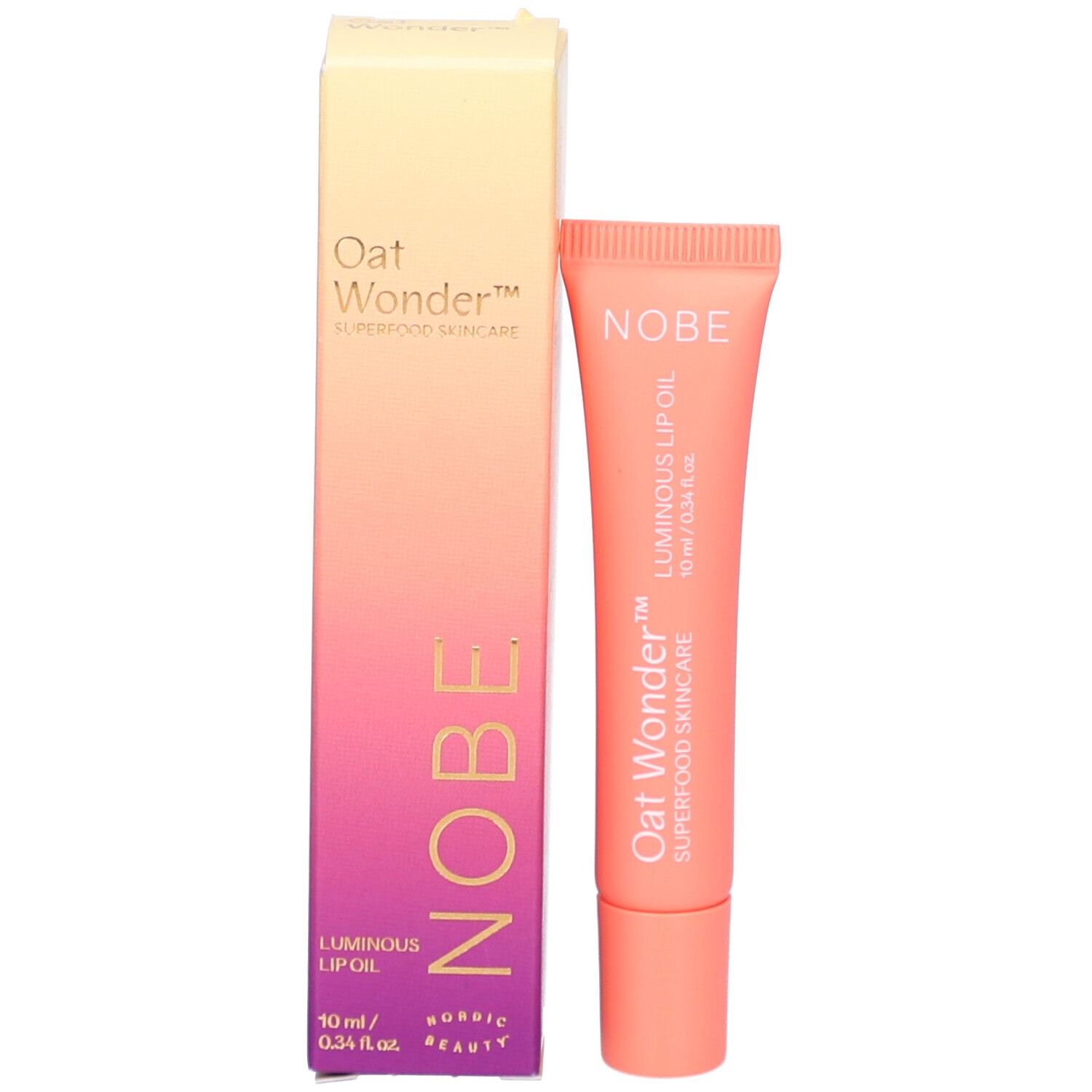 Emballage et tube. Emballage: NOBE Oat Wonder Luminous Lip Oil. Tube: rose, texte.