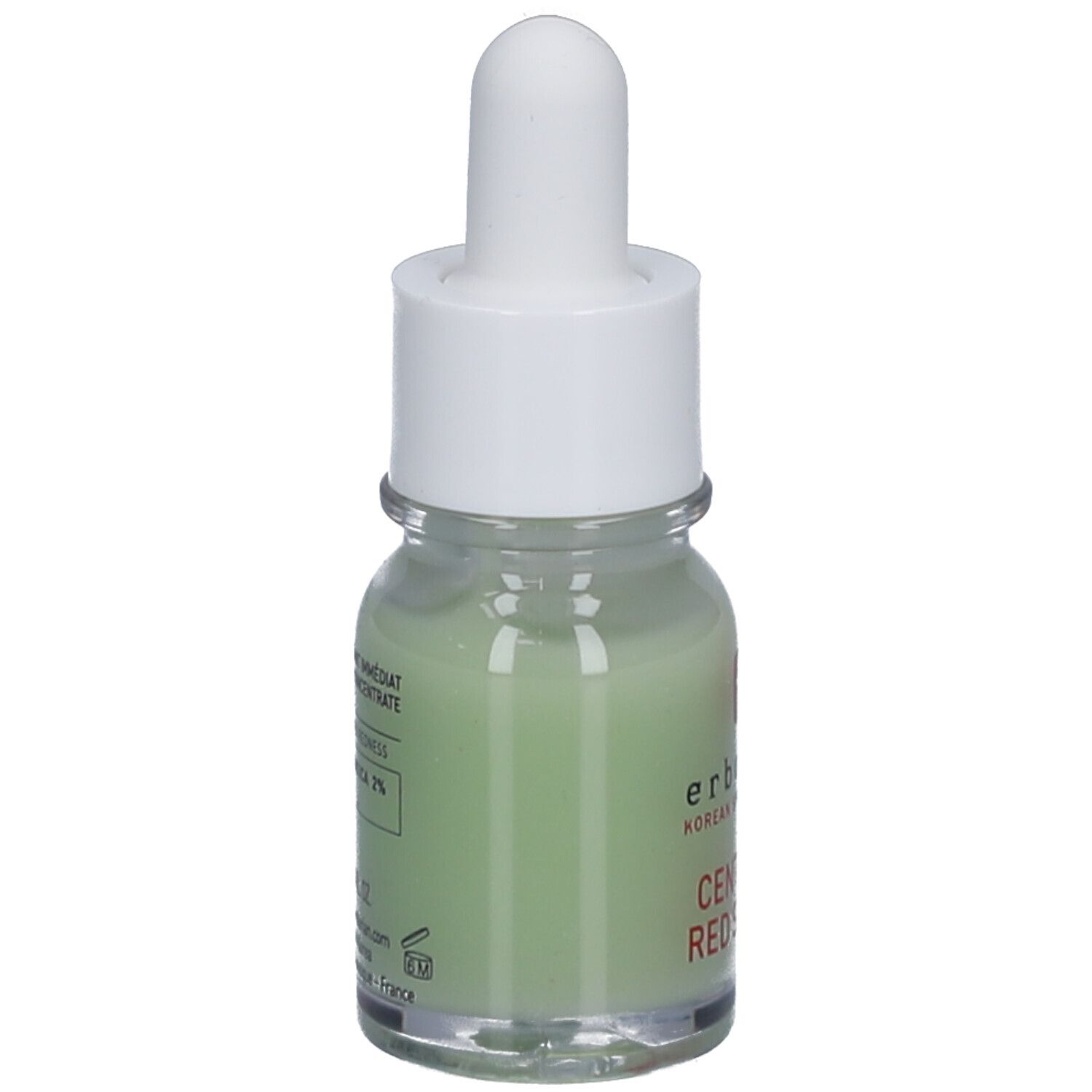 Petite bouteille en verre avec liquide vert, bouchon blanc et pipette. Inscription: CENTELLA RED SERUM. Texte au dos.