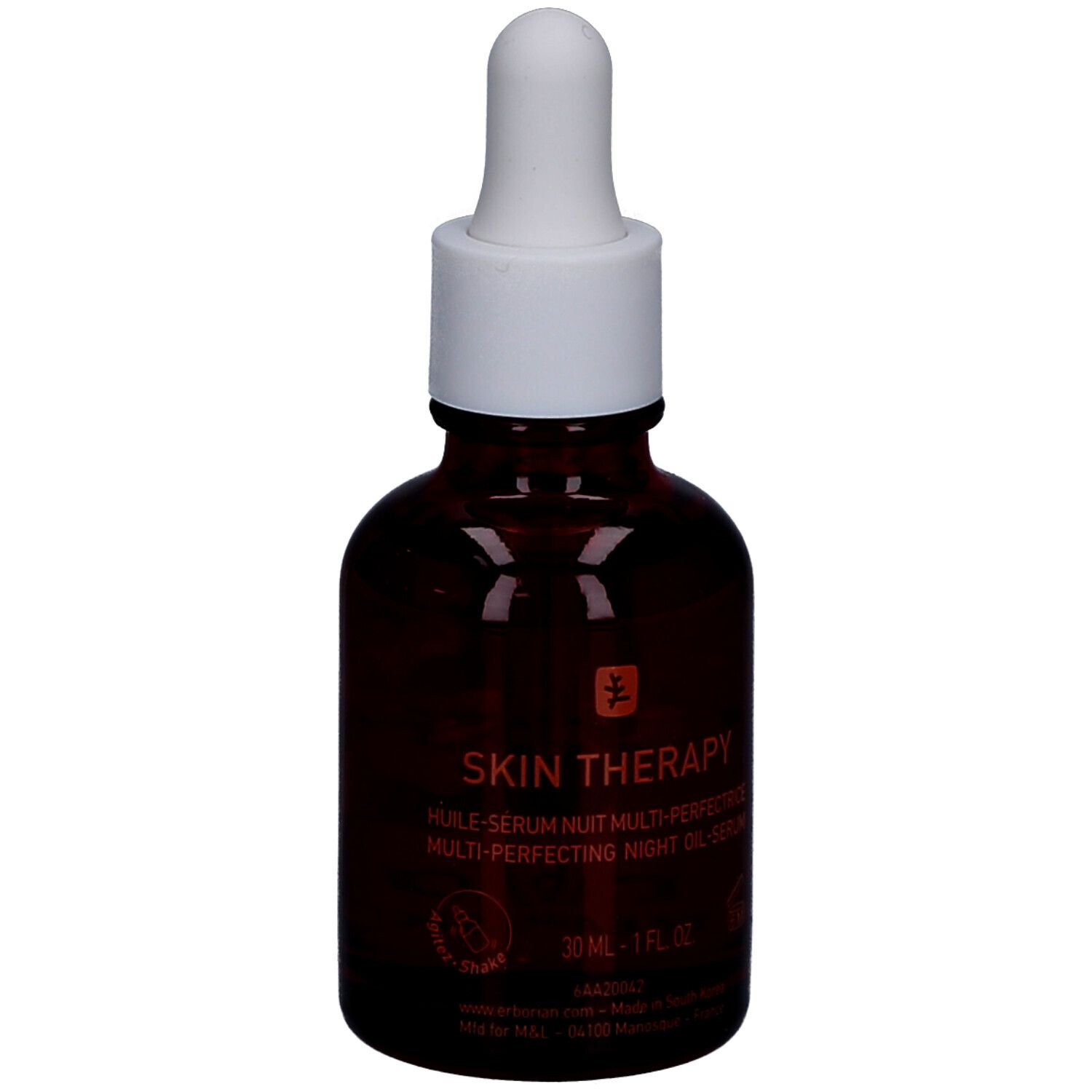 Flacon en verre brun avec bouchon compte-gouttes, Erborian Skin Therapy Oil.