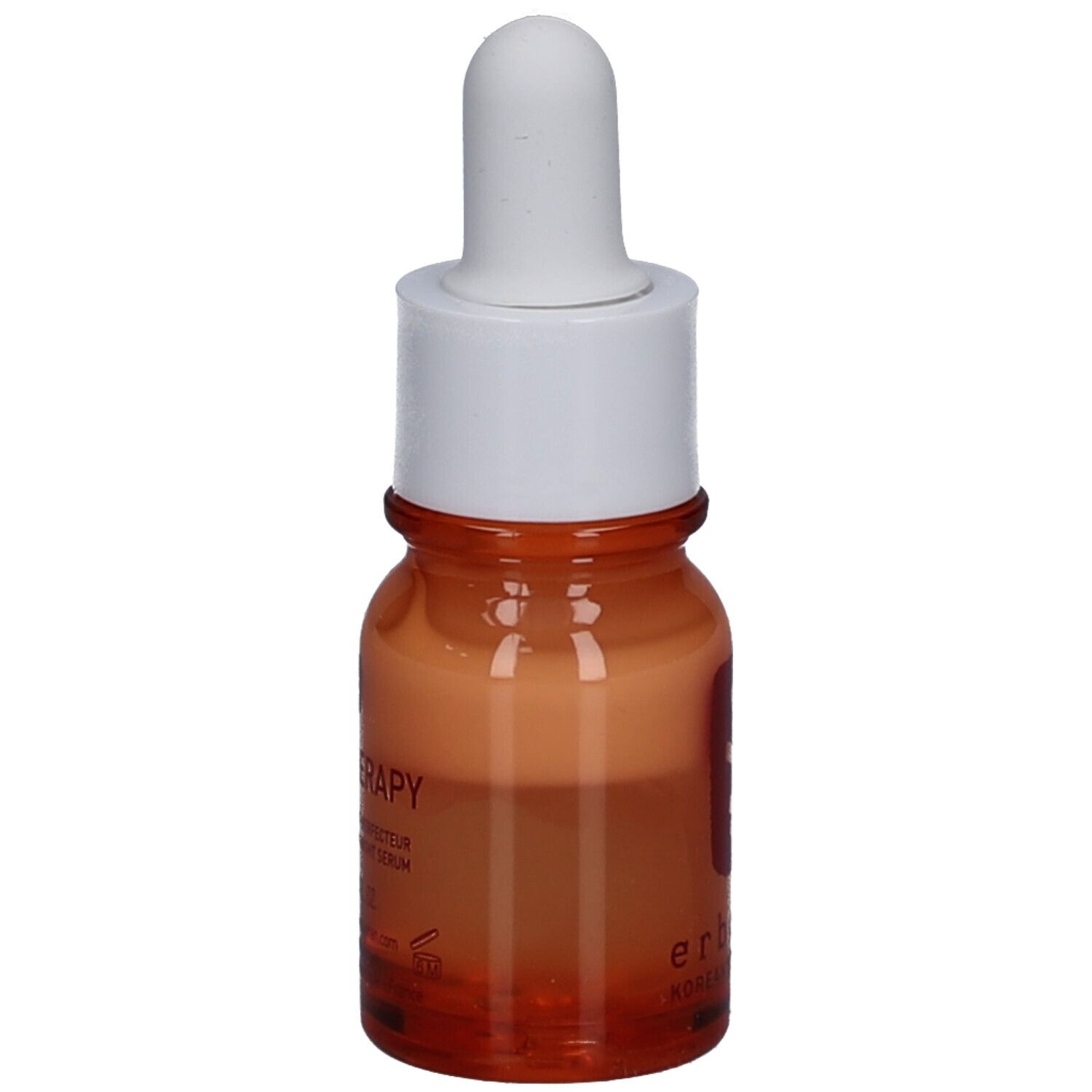 Sérum Erborian Skin Therapy Light dans un petit flacon en verre avec pipette, vue de côté.