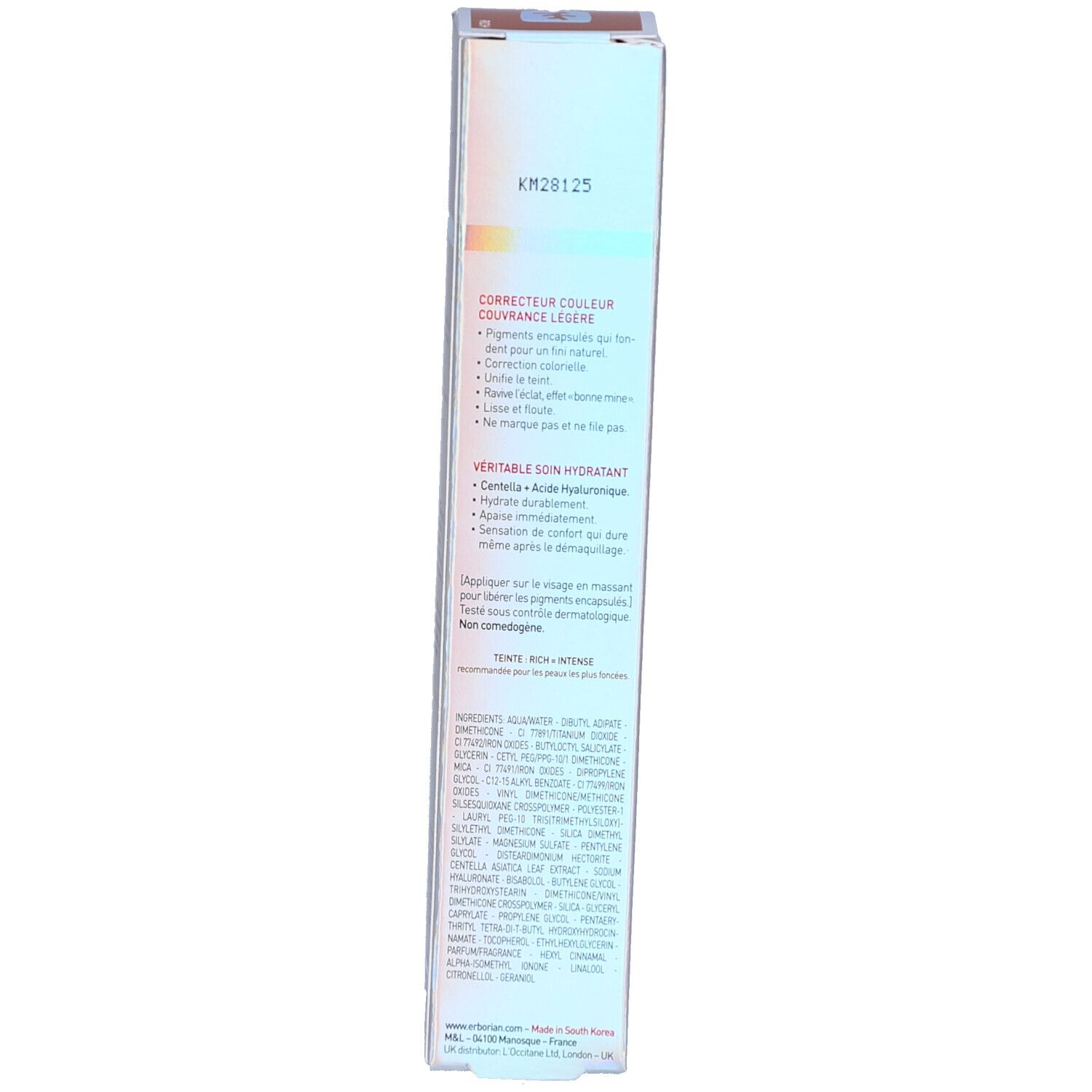 Côté de la boîte avec texte. Contient des informations sur le produit et les ingrédients.