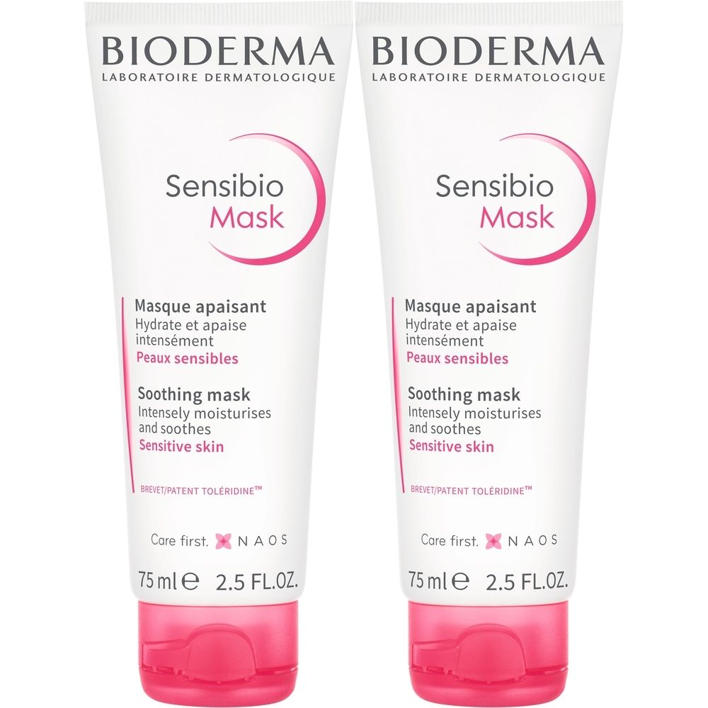 Deux tubes de BIODERMA Sensibio Mask. Tubes blancs avec accents roses. Texte: Sensibio Mask, masque apaisant pour peaux sensibles.
