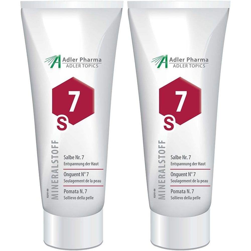 Deux tubes blancs de MINERALSTOFF Salbe Nr. 7. Impression rouge avec le chiffre 7 et le logo Adler Pharma. Texte en allemand, français et italien.