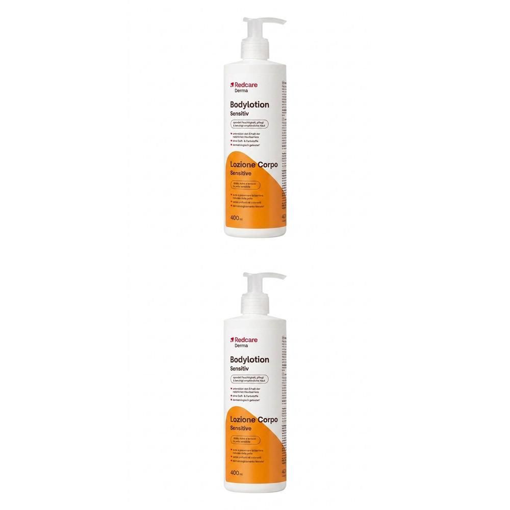 Deux flacons pompe blancs avec Redcare Derma Bodylotion Sensitiv. Étiquettes orange avec informations produit.