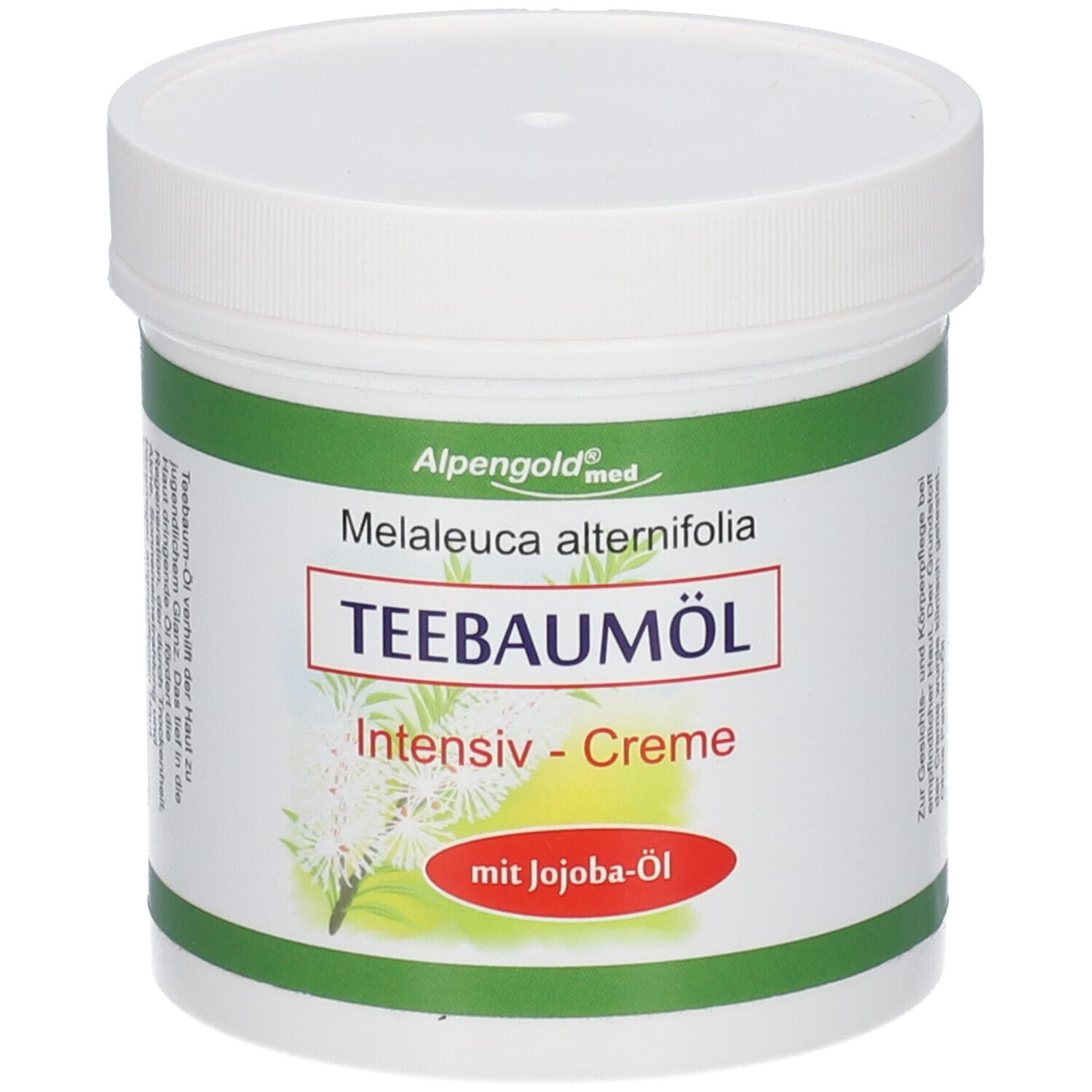 Pot blanc avec étiquette verte et rouge. Inscription : Teebaumöl Intensiv-Creme mit Jojoba-Öl. Marque : Alpengold med.