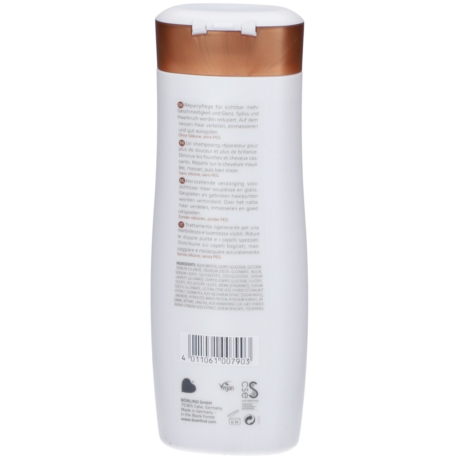 Flacon blanc avec bouchon marron. Inscription: ANNEMARIE BÖRLIND Repair Shampoo. Texte multilingue. Volume: 200 ml.