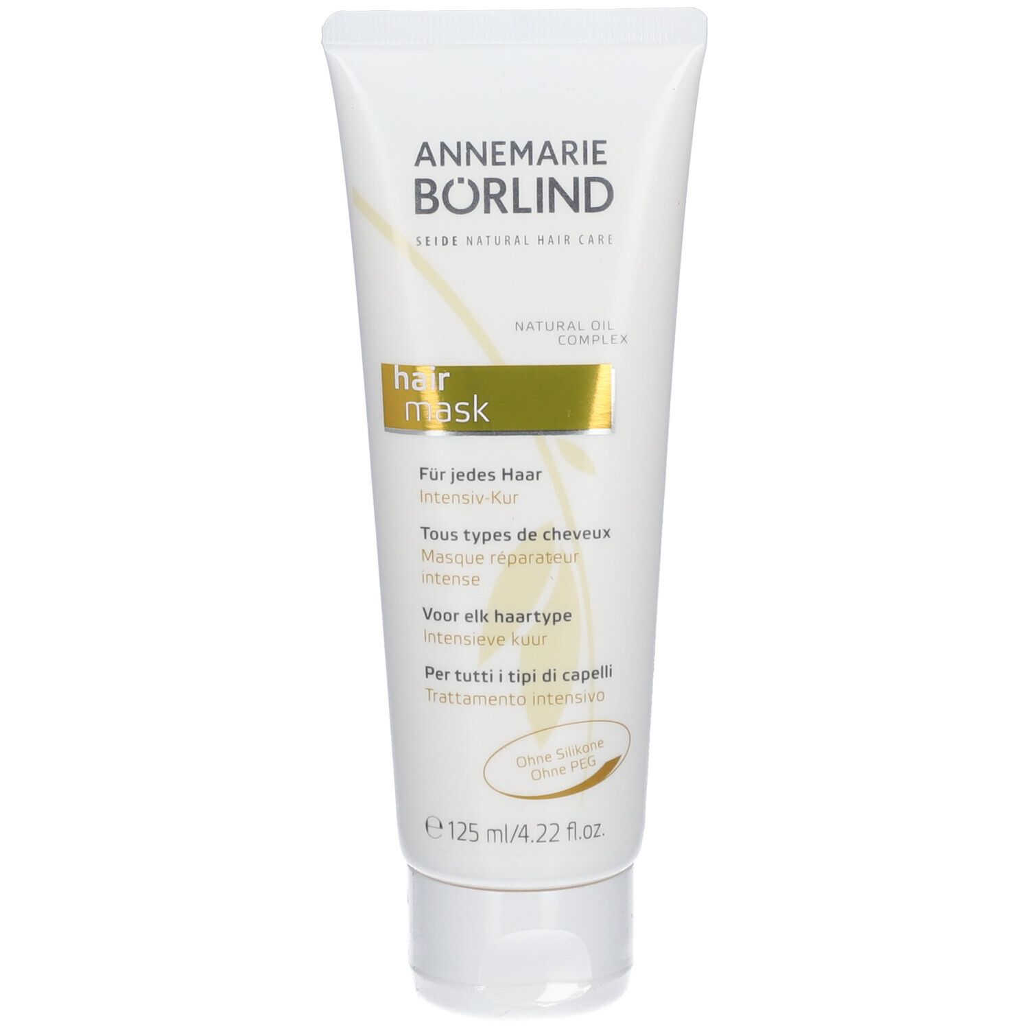 Tube blanc avec "ANNEMARIE BÖRLIND" et "hair mask". Bande dorée. Texte en allemand, français, néerlandais et italien.