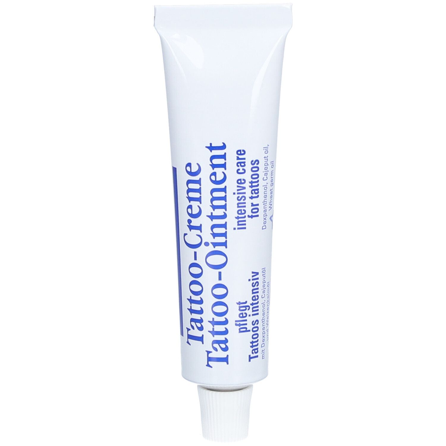 Tube blanc avec texte bleu Tattoo-Creme. Contient du dexpanthénol et de l'huile de cajeput. Soin intensif des tatouages.