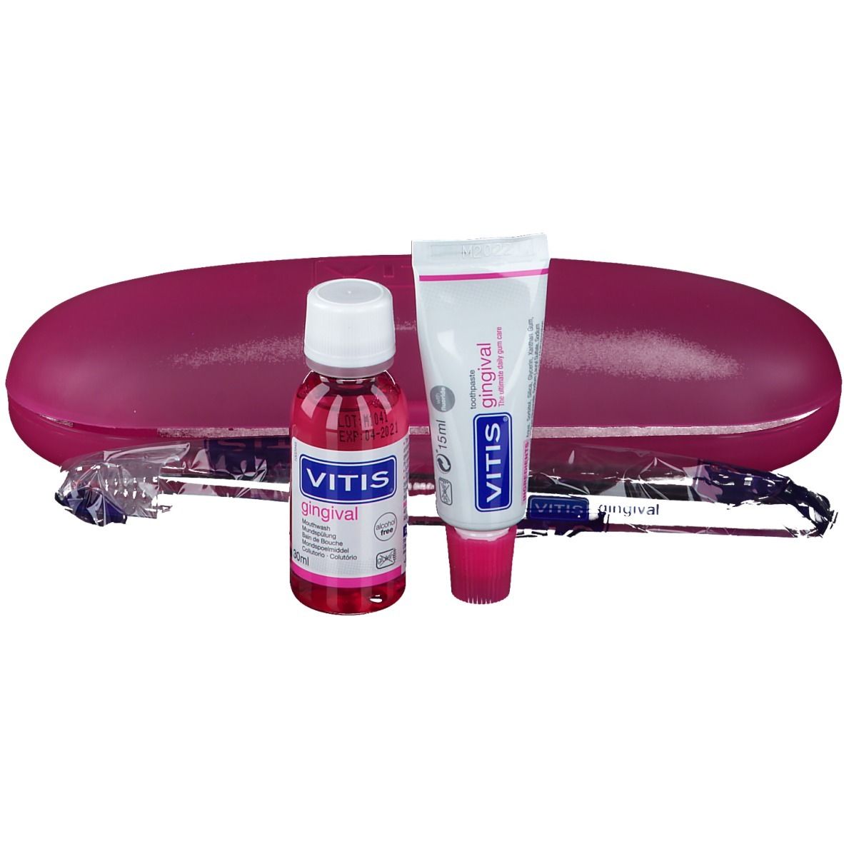 Set VITIS® gingival comprenant bain de bouche, dentifrice et brosse à dents, dans un étui rose. Les produits sont visibles.