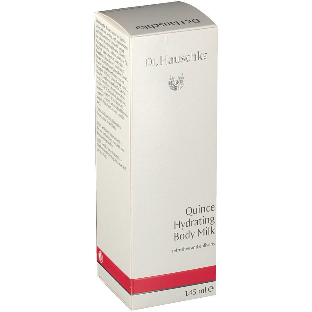 Emballage blanc avec bande rouge. Inscription : Dr. Hauschka, Quince Hydrating Body Milk. Nom du produit et logo.