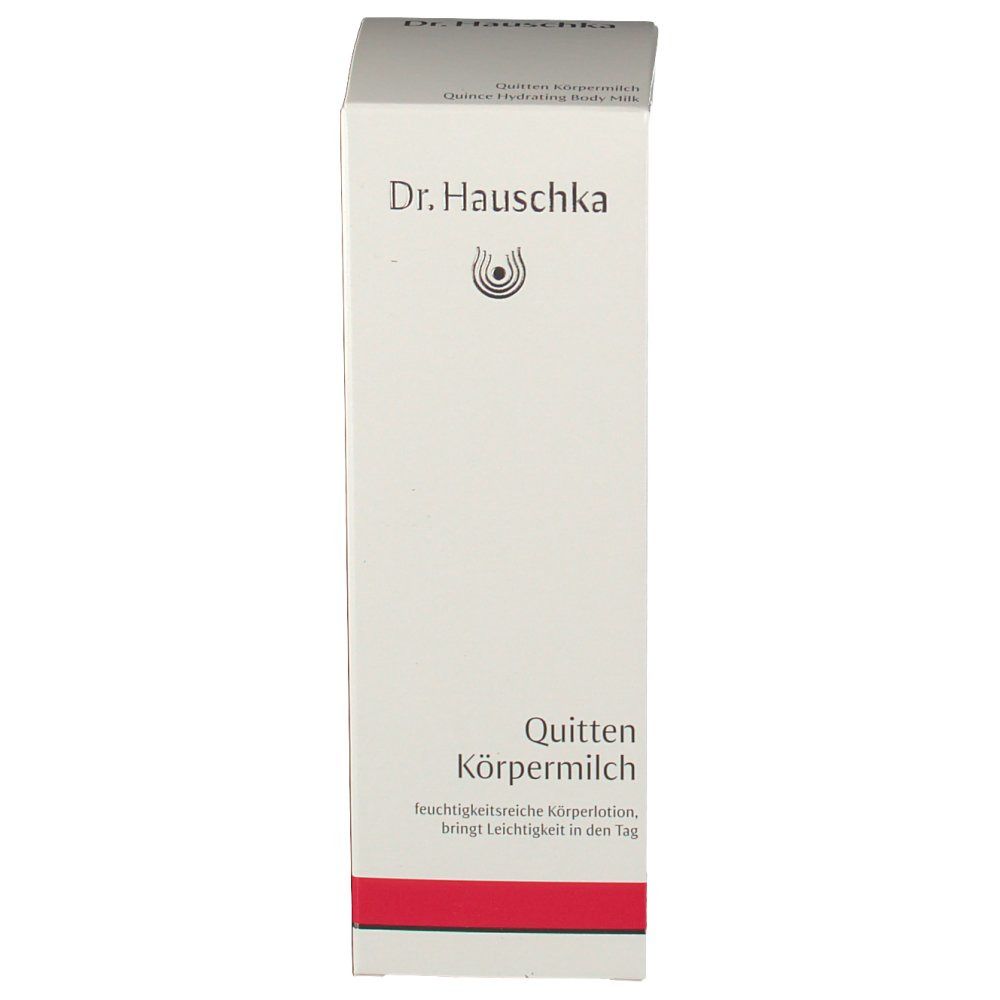 Emballage blanc avec bande rouge. Inscription : Dr. Hauschka, Quitten Körpermilch. Nom du produit et logo.