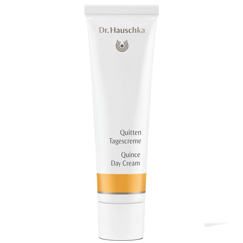 Tube blanche avec bande jaune. Inscription: Dr. Hauschka, Quitten Tagescreme, Quince Day Cream.