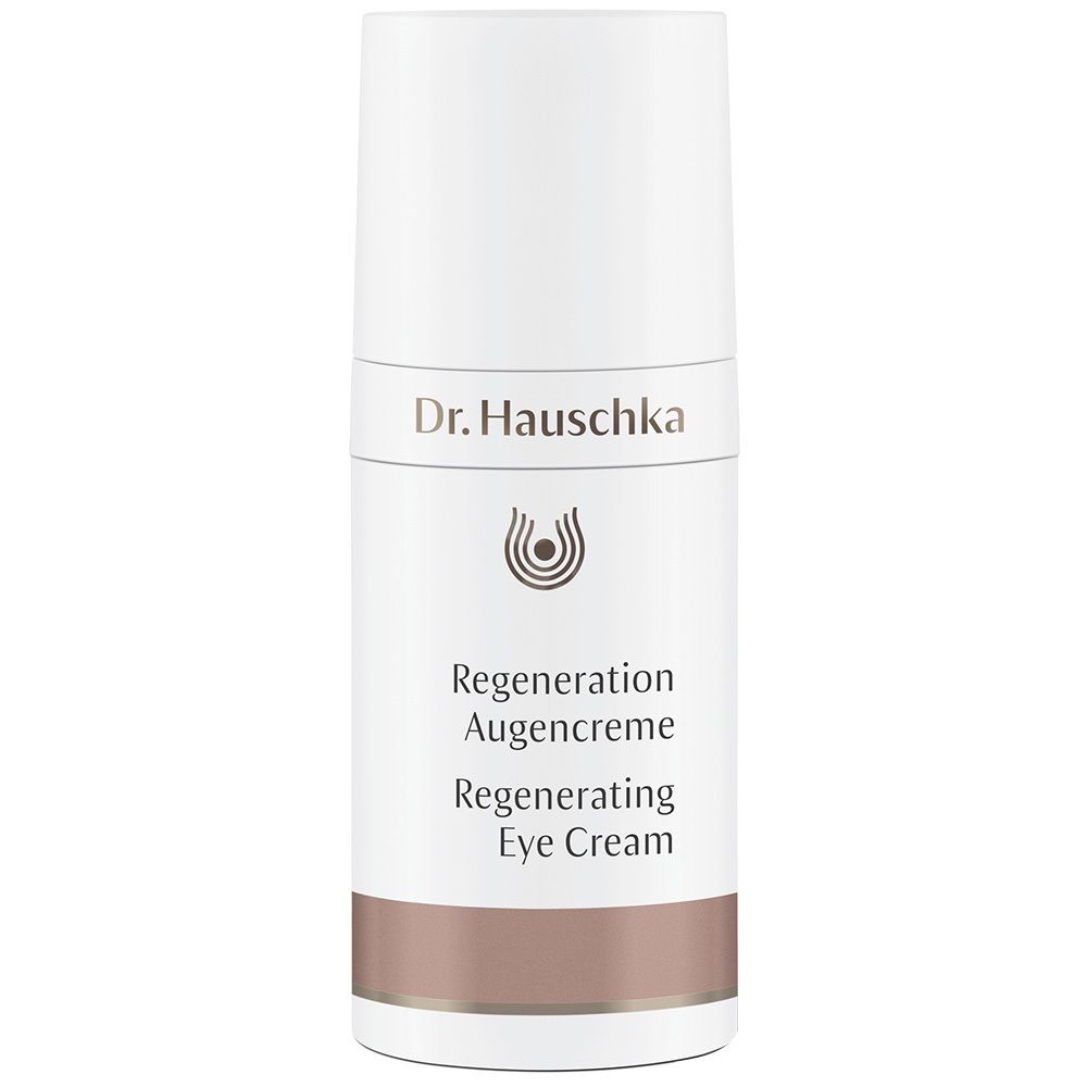 Tube blanche avec "Dr. Hauschka" et "Regeneration Augencreme". Bande marron en bas. Couvercle en haut.