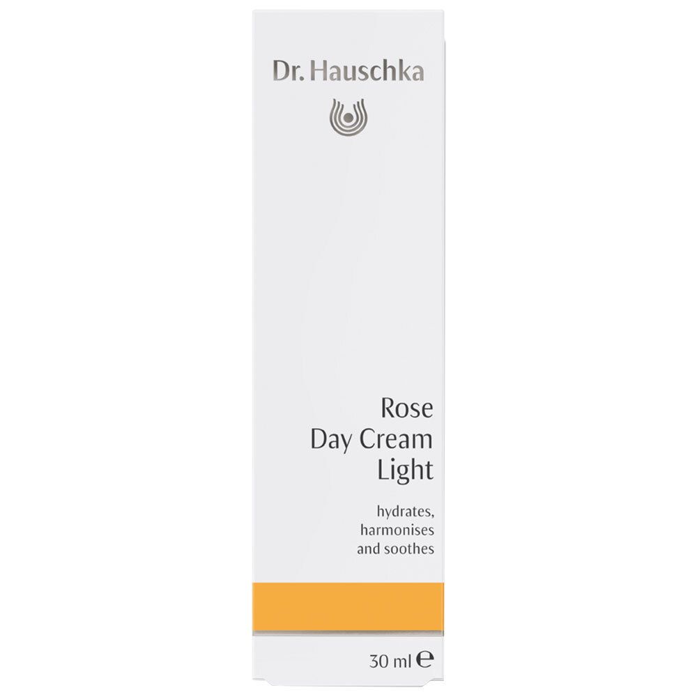 Emballage blanc avec texte. Bande orange. Logo Dr. Hauschka. Crème de jour légère à la rose.