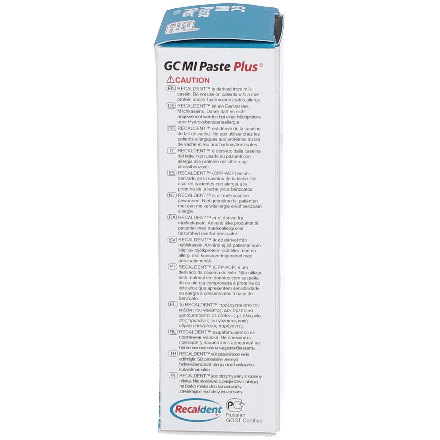 Côté de la boîte de dentifrice. Contient avertissements et informations. Marque: GC MI Paste Plus® Menthe. Texte multilingue.