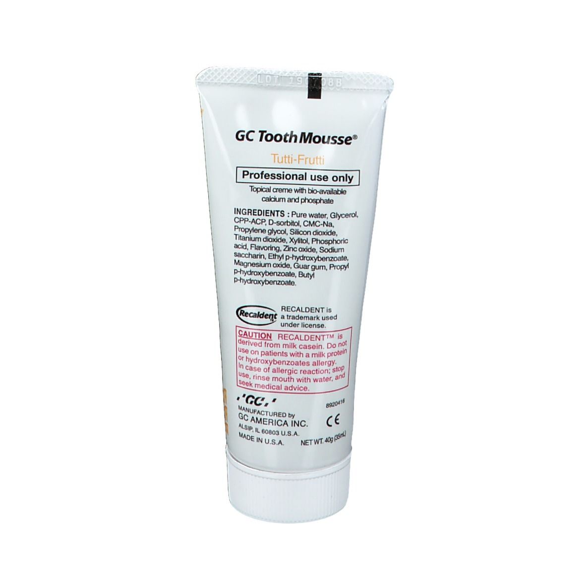 Dos du tube de dentifrice GC Tooth Mousse Tutti Frutti. Liste des ingrédients et avertissements.