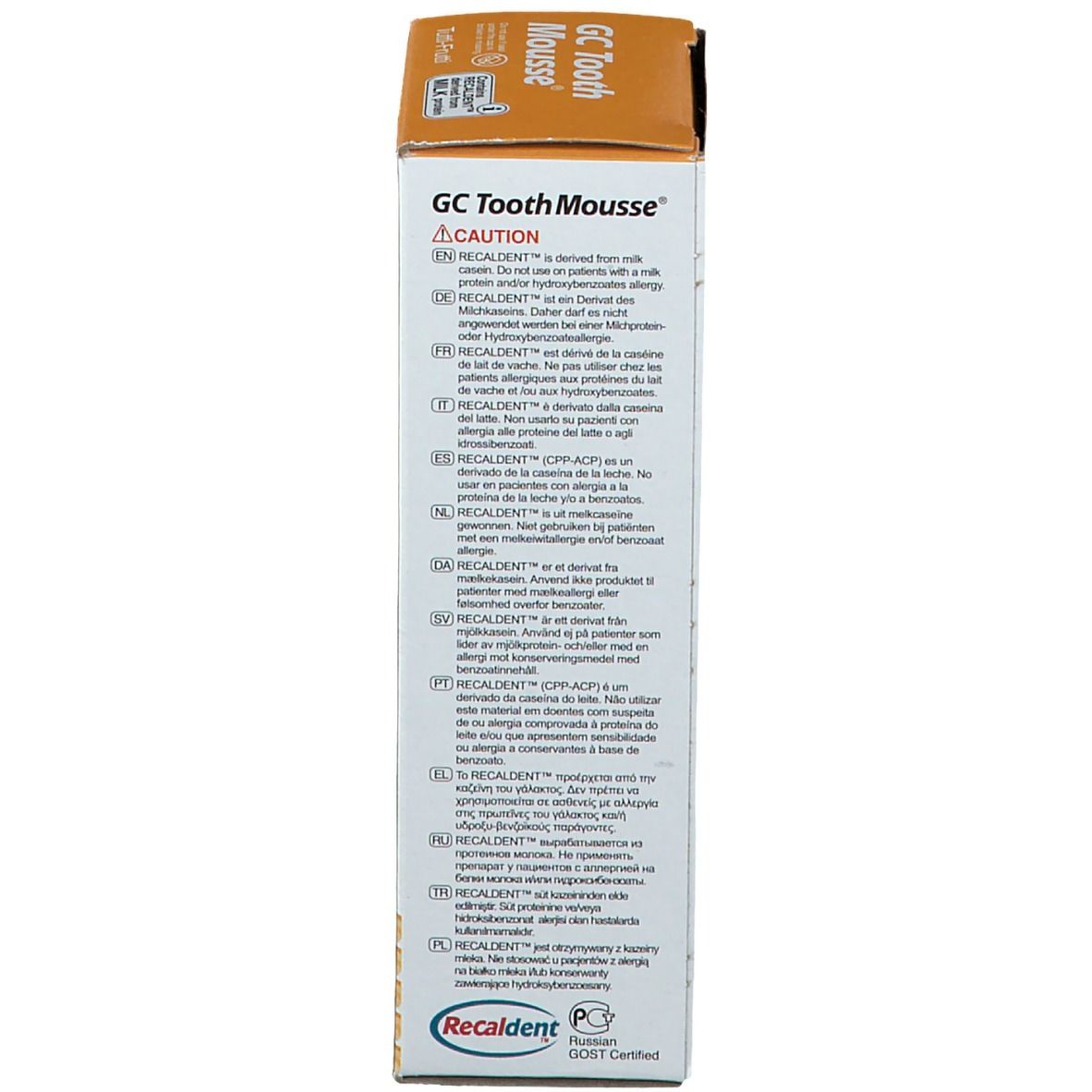 Dos de l'emballage en carton GC Tooth Mousse Tutti Frutti. Avertissements et ingrédients multilingues.