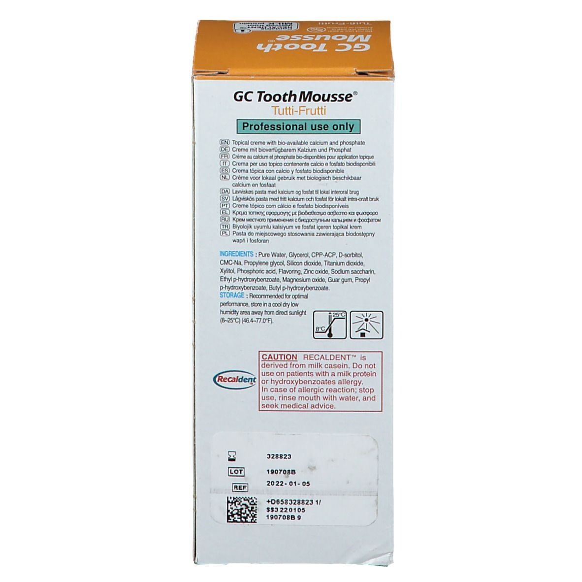 Dos de l'emballage en carton GC Tooth Mousse Tutti Frutti. Liste des ingrédients, avertissements et numéro de lot.