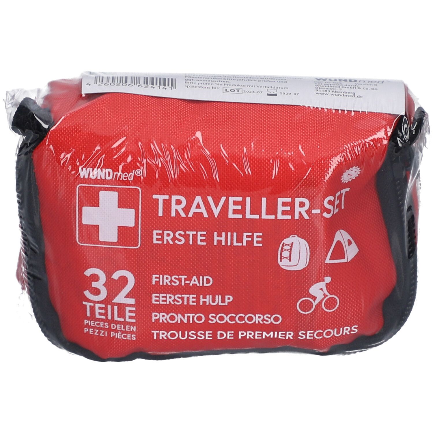 Trousse rouge avec croix blanche et inscription 'Traveller-Set'. Contient 32 pièces. Emballée sous film.