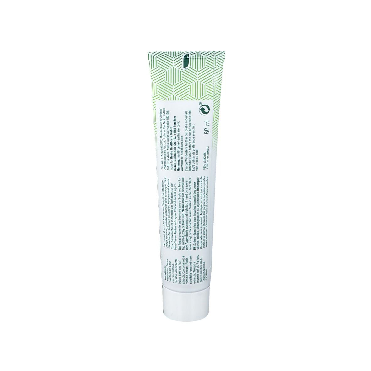 Dos d'un tube de crème. Texte et logos sur fond blanc. Bouchon vert.