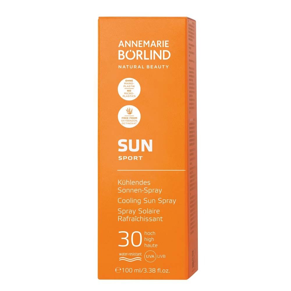 Spray solaire dans une boîte orange. Marque : ANNEMARIE BÖRLIND. Texte : SUN SPORT. Facteur 30. Résistant à l'eau.