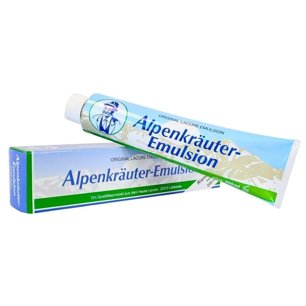 Tube et boîte pliante Lacúre Alpenkräuter-Emulsion avec motif de montagne.