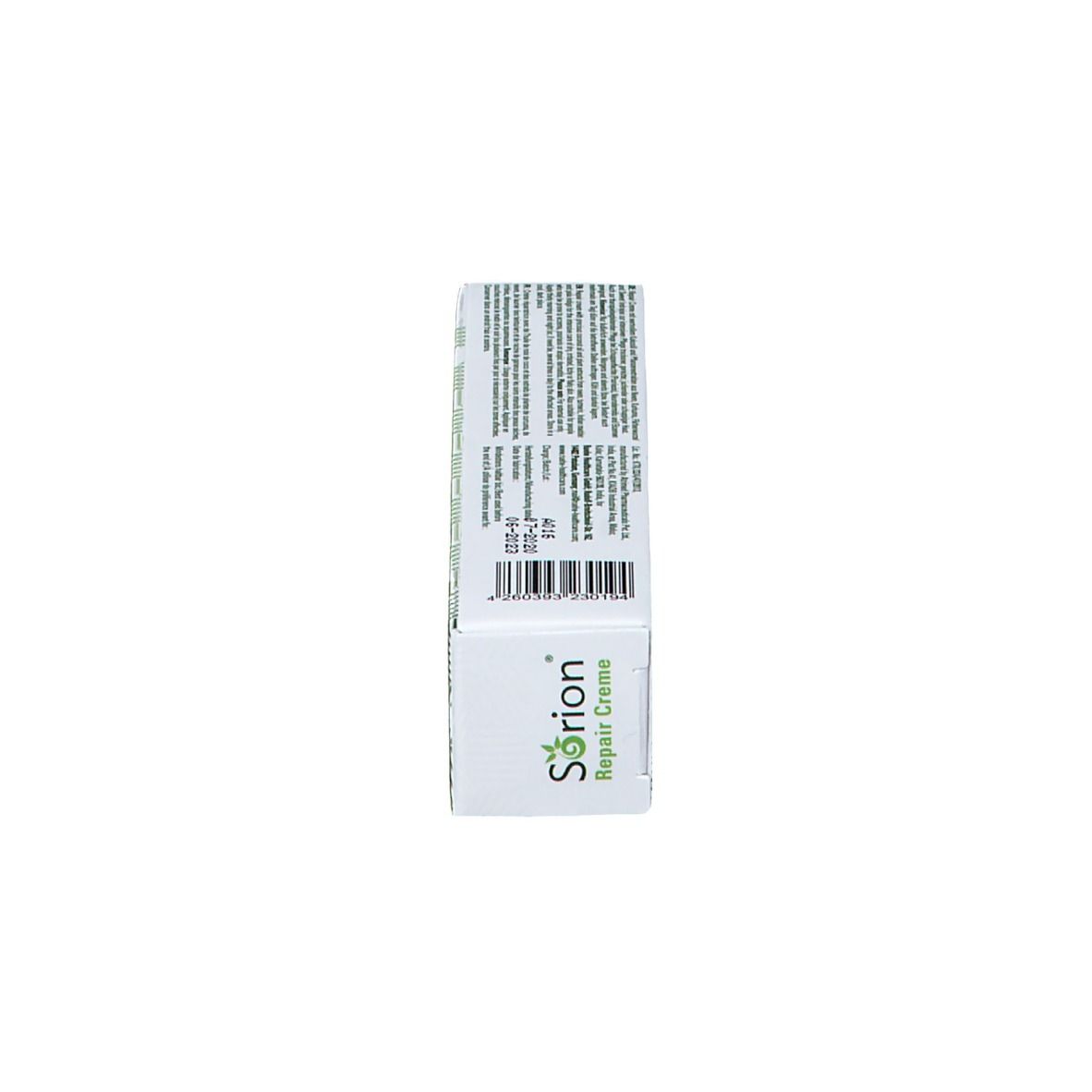 Vue latérale de la boîte. Inscription : Sorion Repair Creme. Emballage vert et blanc. Texte.