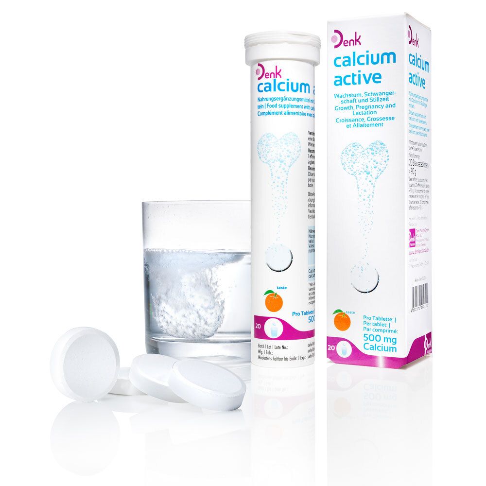 Tube et boîte de Calcium Active à côté d'un verre d'eau et de comprimés. Inscription : 500 mg de calcium. Comprimés effervescents.