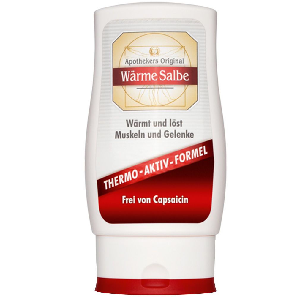 Tube blanche avec bouchon rouge. Inscription: Apothekers Original Wärme Salbe. Thermo-Aktiv-Formel. Sans capsaïcine.